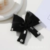 Sparkling diamond, cotton-filled bow accessories, fashionable and versatile clothing and accessories, bags, shoes, floral decorations and accessories details Picture